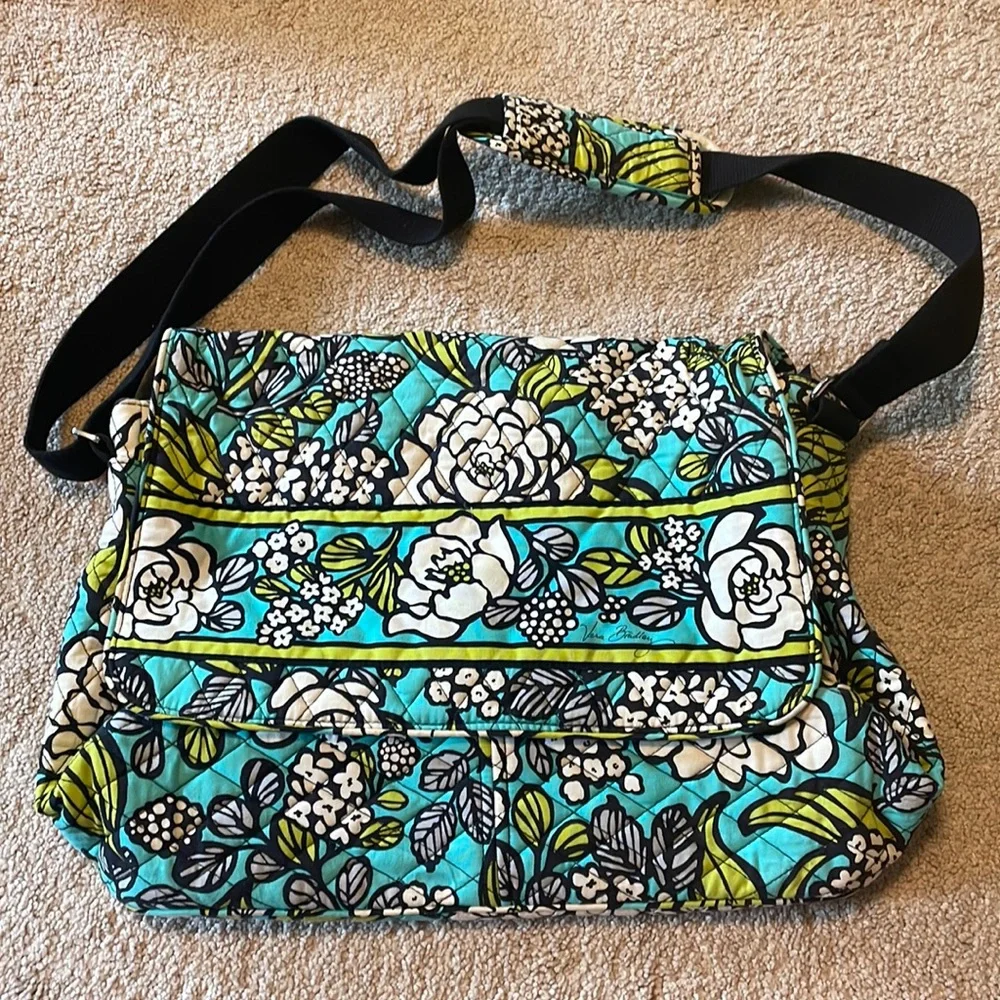 Vera Bradley, blue white, and green laptop case with over the shoulder strap.